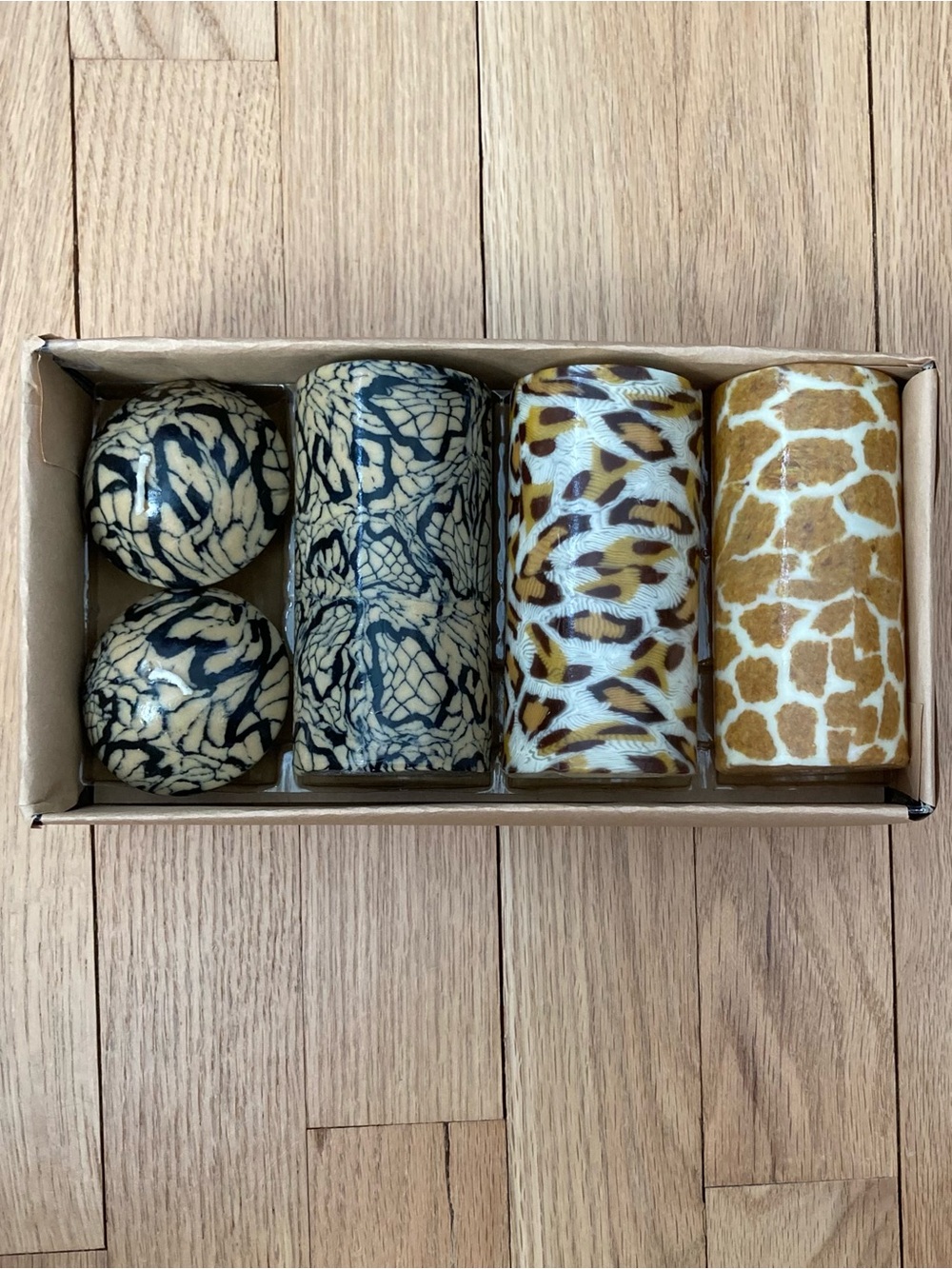 Unscented Animal Print Candles (5)
3 Pillars and 2 mini domes